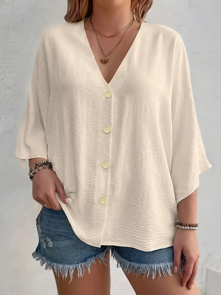 Noora | Signe – Blus med knäppning och ¾-ärm