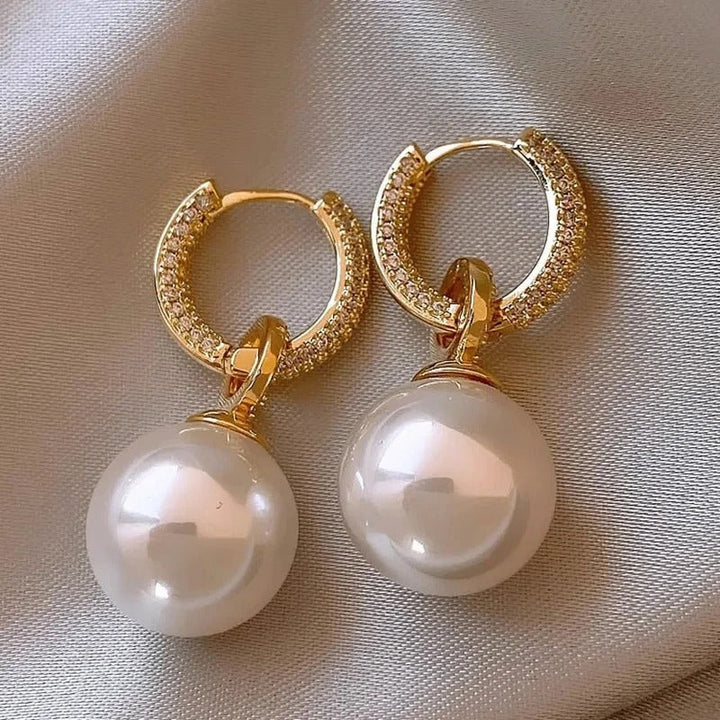 Eleganta vita kulörhängen