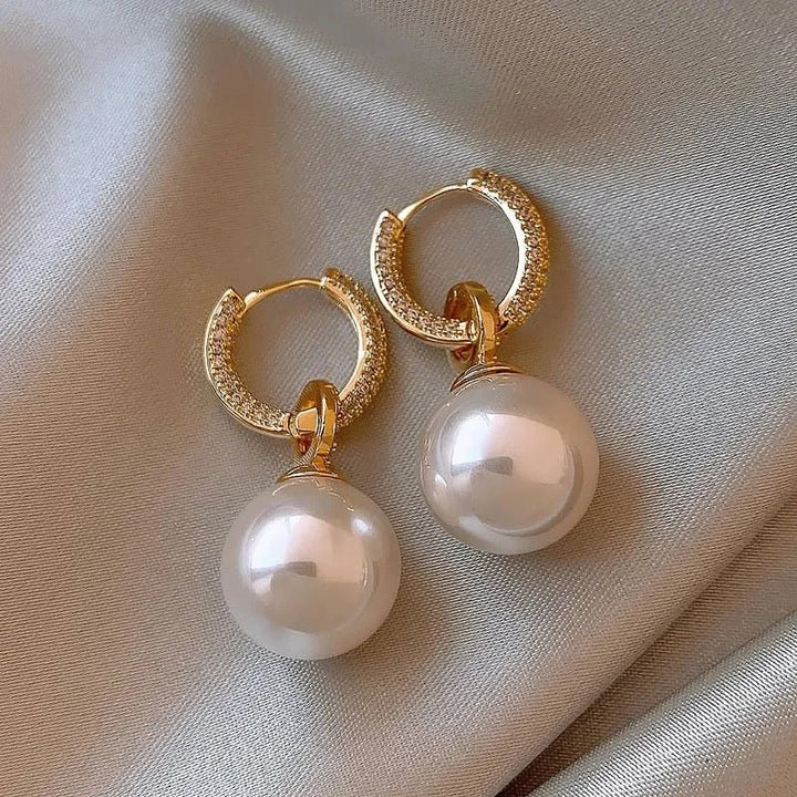 Eleganta vita kulörhängen